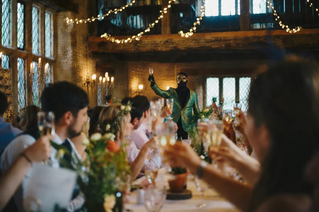 A private table, mid-toast